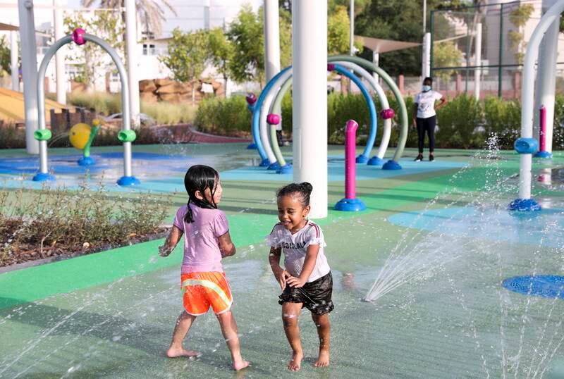 Children at the waterpark in the revitalised Sheikha Fatima bint Mubarak community park in Khalidiya.