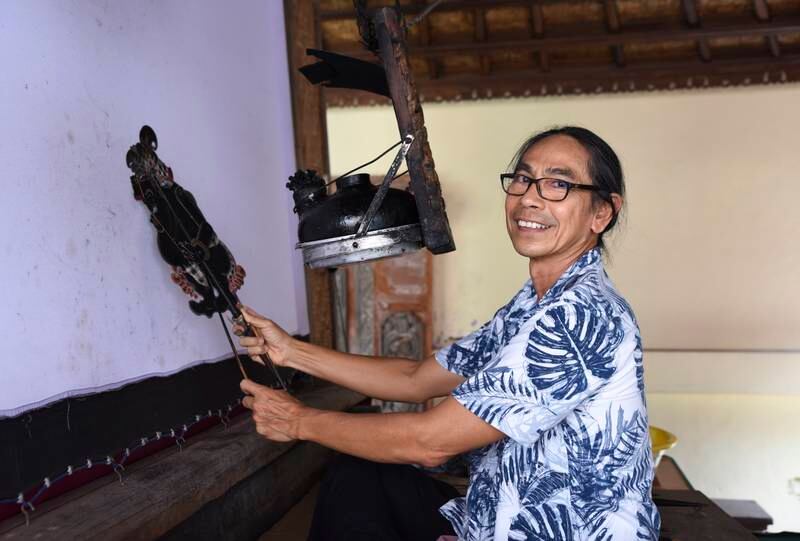 In Bali theatre, demons, warriors and deities dance behind a sheet. Photos: Ronan O'Connell