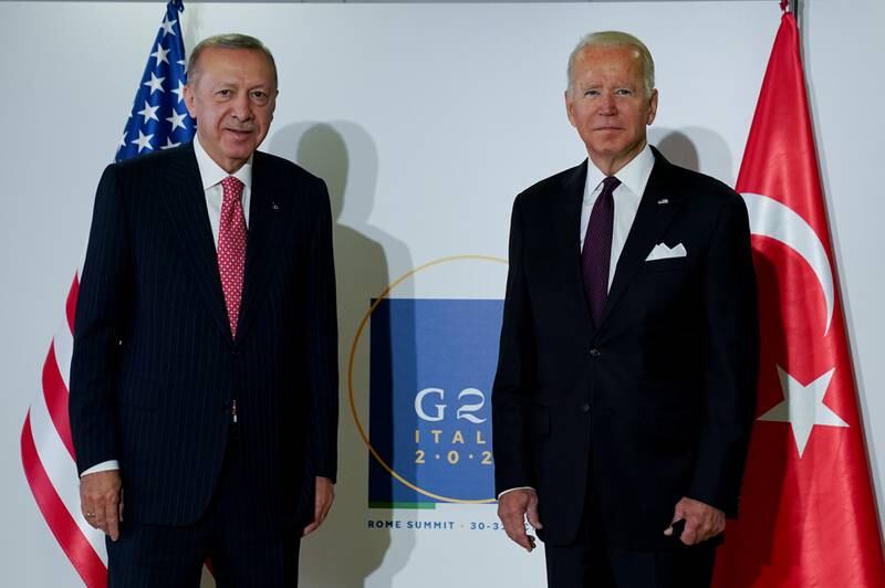 US President Joe Biden and Turkey's President Recep Tayyip Erdogan pose for a photo as they attend a bilateral meeting, on the sidelines of the G20 leaders' summit in Rome. Reuters