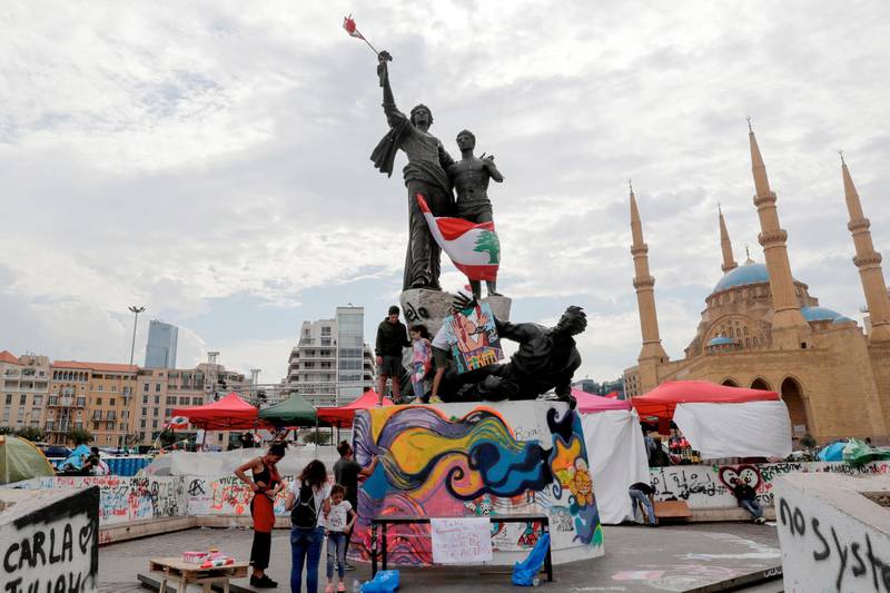 Lebanese protesters gather around Martyrs Square monument in Lebanon's capital Beirut during ongoing anti-government demonstrations. AFP