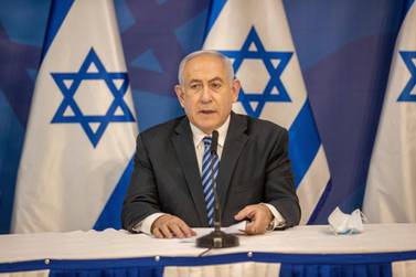 Israeli Prime Minister Benjamin Netanyahu issues a statement at the Israeli Defense Ministry in Tel Aviv, Israel, Monday, July 27, 2020. Israeli forces exchanged fire with Hezbollah on Monday for over an hour along the volatile Israeli-Lebanese frontier, the heaviest bout of fighting between the bitter enemies in nearly a year. (AP Photo/Tal Shahar, Yediot Ahronot, Pool)