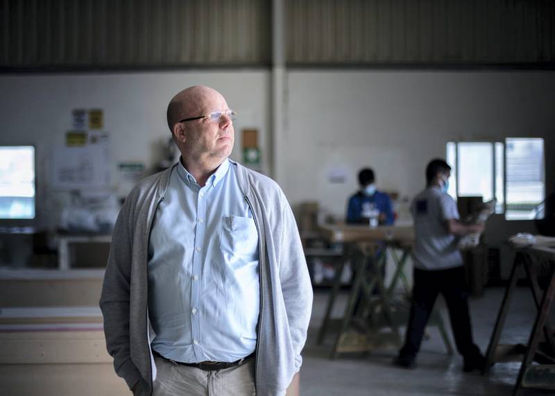 DUBAI, UNITED ARAB EMIRATES. 25 January 2021.
Hugh Bigley, second to right, Managing Director, Deco Emirates. Deco Emirates Deco Emirates has inoculated a big percentage of their staff in drive to vaccinate all on site. (Photo: Reem Mohammed/The National)

Reporter:
Section: