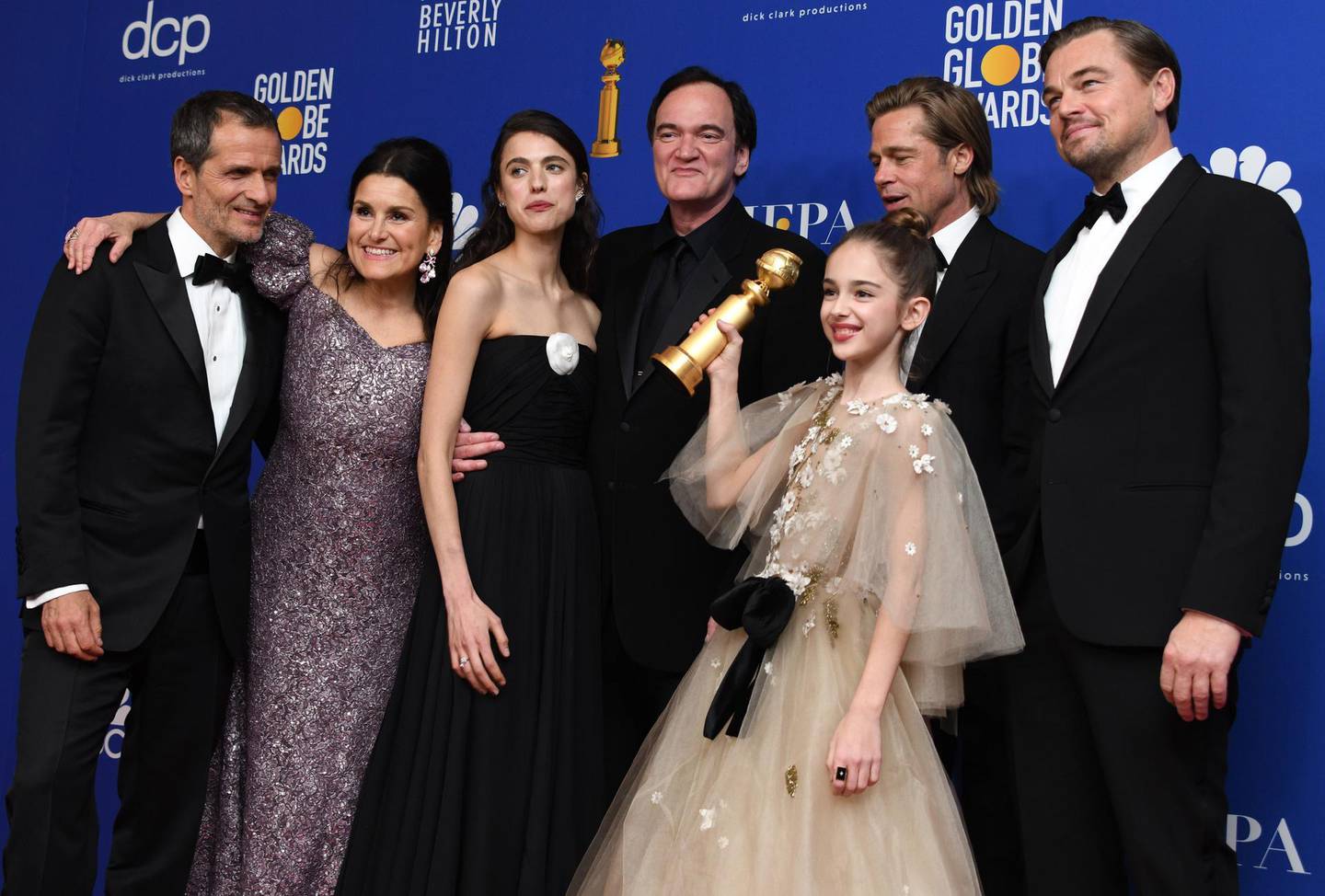 epa08106655 (L-R) David Heyman, Shannon McIntosh, Margaret Qualley, Quentin Tarantino, Brad Pitt, Julia Butters, and Leonardo DiCaprio pose with the award for Best Motion Picture Musical or Comedy for 'Once Upon A Time... In Hollywood' in the press room during the 77th annual Golden Globe Awards ceremony at the Beverly Hilton Hotel, in Beverly Hills, California, USA, 05 January 2020.  EPA/CHRISTIAN MONTERROSA