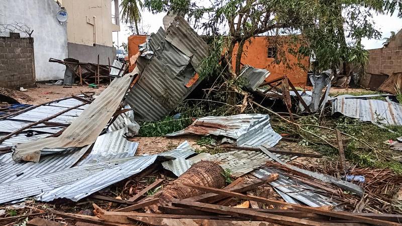 A view of a damaged house in Macomia following Cyclone Kenneth on April 28, 2019. Thousands of people in remote areas of storm-lashed Mozambique were homeless and bracing for imminent flooding April 27, food and water shortages as Cyclone Kenneth flattened entire villages, leaving rescuers struggling to reach them. AFP