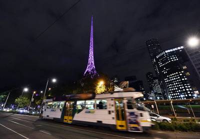 The Victorian Arts Centre in Melbourne, Australia, was among the many buildings around the world lit up in purple. Other landmarks included the Eiffel Tower in Paris, Empire State Building in New York, and Niagara Falls. Julian Smith / EPA
