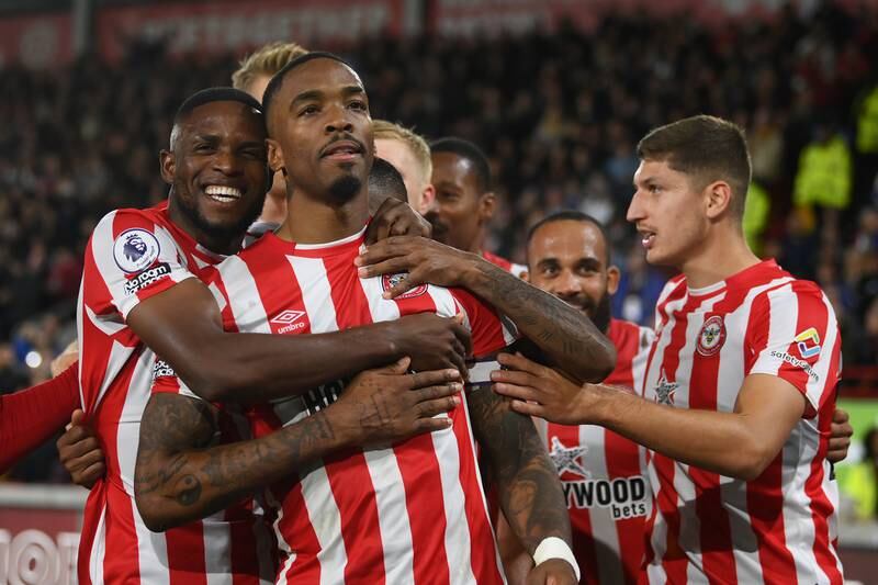 Ivan Toney celebrates with team-mates after scoring. Getty