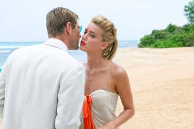 Aaron Eckhart and Amber Heard star in The Rum Diary, an adaptation of the book by Hunter S Thompson.