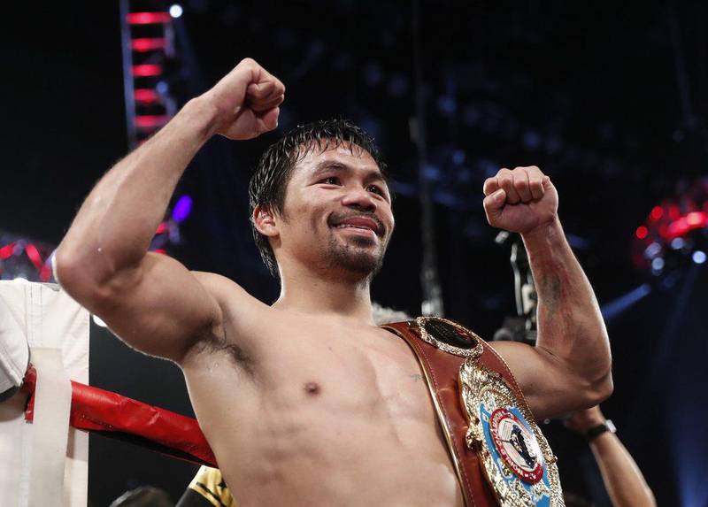 Manny Pacquiao, of the Philippines, celebrates after defeating Jessie Vargas in their WBO welterweight title boxing match, Saturday, November 5, 2016, in Las Vegas. Isaac Brekken / AP Photo