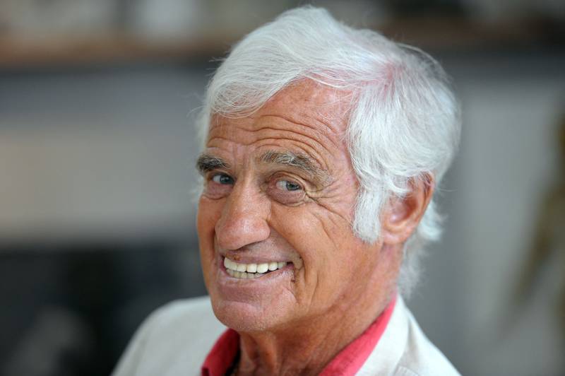 In this file photo taken on September 9, 2010, Jean-Paul Belmondo smiles in the recreation of his father's studio at the Paul Belmondo museum. AFP
