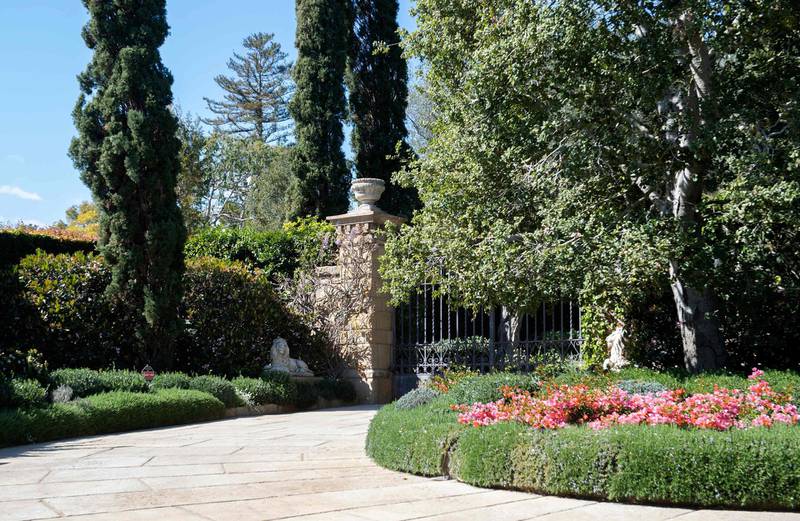 View of the gate of the Estate where Prince Harry and his wife US actress Meghan Markle have their house, in Montecito, California on March 6, 2021. Prince Harry and Meghan Markle headed to California and relocated in July, 2020 to Montecito, a small and affluent seaside city 100 miles (160 kilometers) up the coast, where a spokesperson said they had "settled into the quiet privacy of their community." The area is home to a handful of showbiz stars including Oprah Winfrey, Ellen DeGeneres and Rob Lowe. 
Meghan Markle said it feels "liberating" to be able to speak out about her life in the British royal family in an excerpt released March 5, 2021, of her hotly anticipated interview with US host Oprah Winfrey. 
 / AFP / VALERIE MACON

