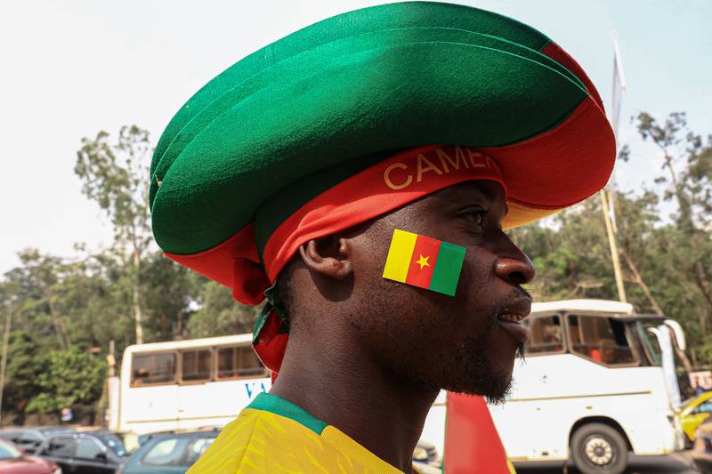A vendor sells Cameroon football attire in Yaounde. AFP
