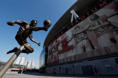 Soccer Football - A Dennis Bergkamp statue is seen at the Emirates Stadium as twelve of Europe's top football clubs launch a breakaway Super League - London, Britain - April 19, 2021  REUTERS/Paul Childs