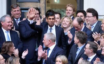 Richard Pohle's picture of Rishi Sunak greeted by Conservative staff, after winning the nomination to lead the party, has been shortlisted in the Sony National Newspaper Photographer of the Year category