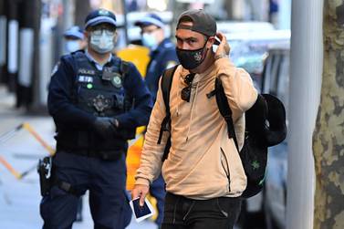 epa09205841 Australian cricketer Glenn Maxwell (R) arrives for hotel quarantine at the Marriott Hotel in Sydney, Australia, 17 May 2021. EPA/JOEL CARRETT AUSTRALIA AND NEW ZEALAND OUT