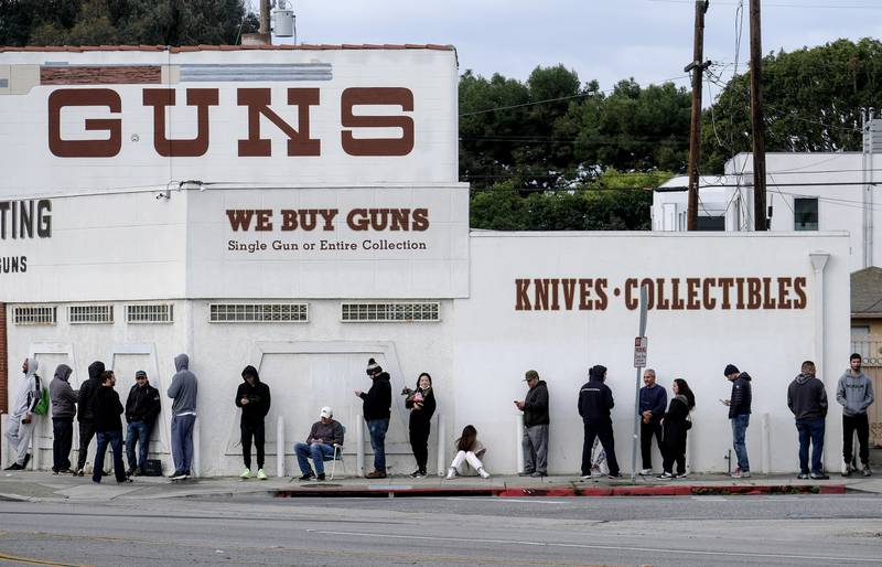 People queue to enter a gun store in Culver City, California. AP