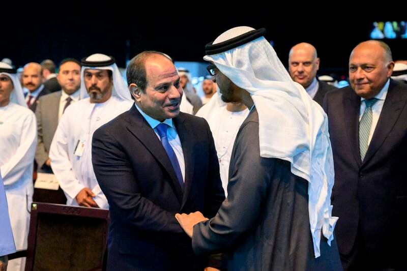 Sheikh Mohamed greets Mr El Sisi. Photo: Presidential Court