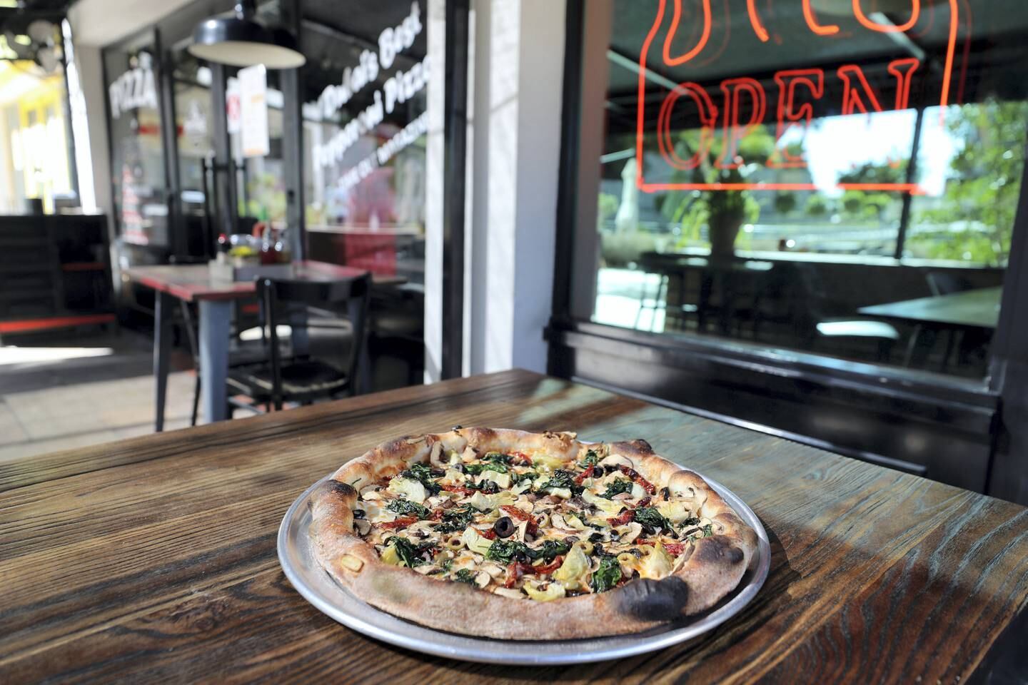 Dubai, United Arab Emirates - Reporter: Sophie Prideaux. Lifestyle. Food. Restaurant feature. Eat your way around JLT. A Vegie Premo pizza from Pitfire Pizza. Monday, January 18th, 2021. Dubai. Chris Whiteoak / The National