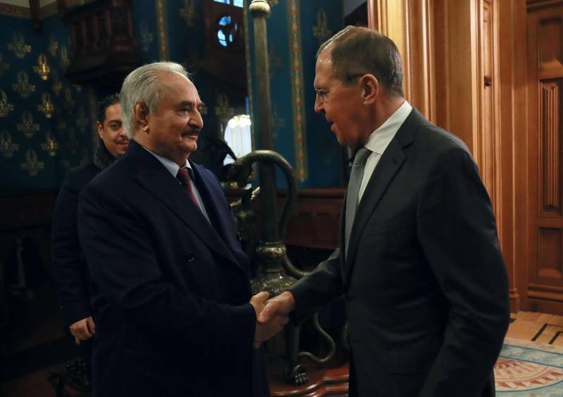 This handout picture released by the Russian Foreign Ministry on January 13, 2020 shows Russian Foreign Minister Sergei Lavrov welcoming Libya's military strongman Khalifa Haftar in Moscow. RESTRICTED TO EDITORIAL USE - MANDATORY CREDIT "AFP PHOTO / RUSSIAN FOREIGN MINISTRY / HO " - NO MARKETING - NO ADVERTISING CAMPAIGNS - DISTRIBUTED AS A SERVICE TO CLIENTS
 / AFP / RUSSIAN FOREIGN MINISTRY / HO / RESTRICTED TO EDITORIAL USE - MANDATORY CREDIT "AFP PHOTO / RUSSIAN FOREIGN MINISTRY / HO " - NO MARKETING - NO ADVERTISING CAMPAIGNS - DISTRIBUTED AS A SERVICE TO CLIENTS

