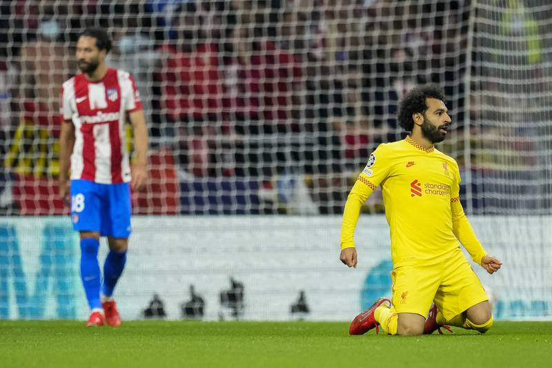 11.  Salah celebrates after scoring the opening goal in the 3-2 Champions League win at Atletico Madrid on October 19. AP