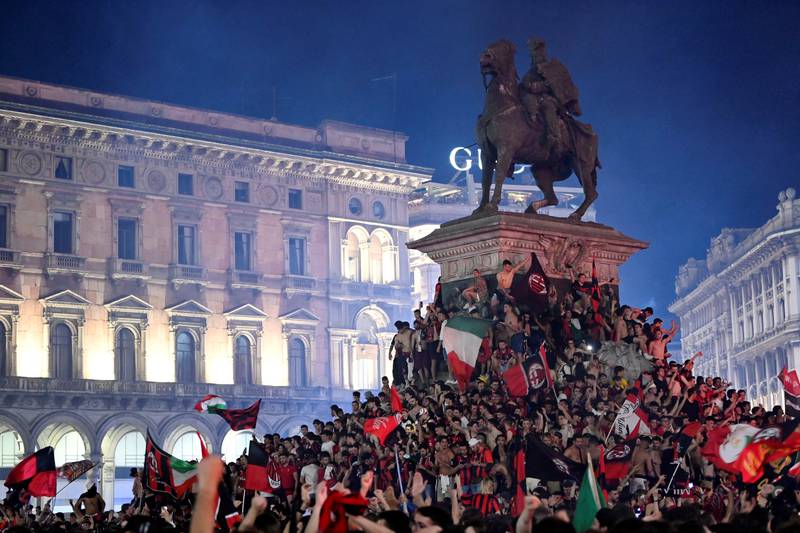AC Milan fans celebrate after winning the Serie A title, in Milan, Italy. Reuters