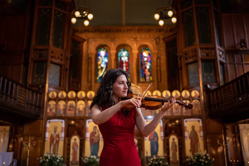 Violinist Irene Duval rehearses before a fundraiser to support  Ukrainians arriving in the UK, at the Ukrainian Catholic Cathedral in London. PA