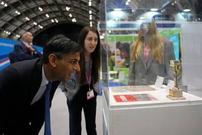 Mr Sunak tours the Exhibitor's Hall. Getty Images