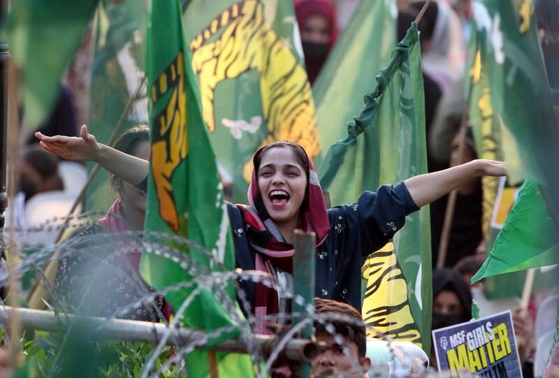 Supporters of Nawaz Sharif wait for his arrival in Lahore, Pakistan, on October 21. EPA