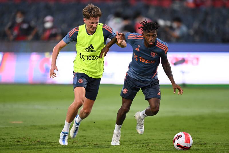 Manchester United's Brazilian midfielder Fred, right, takes part in a training session at Rajamangala National Stadium in Bangkok. AFP