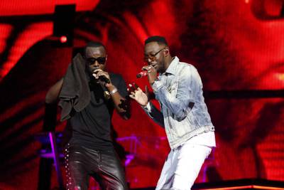 French rapper Gims, left, performs one of the official songs for the Qatar World Cup ‘Arhbo’, with Puerto Rican reggae star Ozuna. AFP