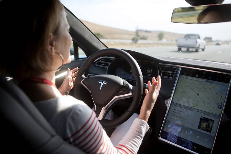 New autopilot features are demonstrated in a Tesla Model S during a Tesla event in Palo Alto, California. Beck Diefenbach / Reuters