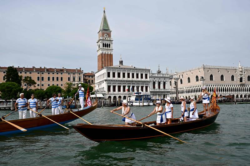 Rowers take part in the annual Venice Historical Regatta. AFP