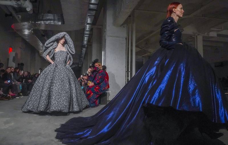 In the bowels of the Empire State Building, on a bare concrete floor, Siriano rolled out his huge, signature ball gowns. AP