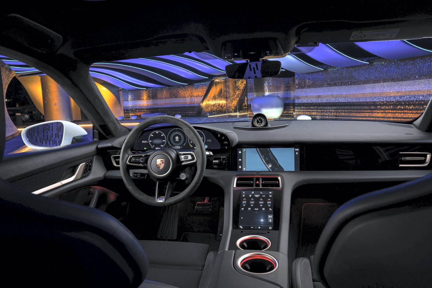 The cockpit features a free-standing curved instrument cluster and central, 10.9-inch infotainment display and an optional passenger display combined to form an integrated glass band. 