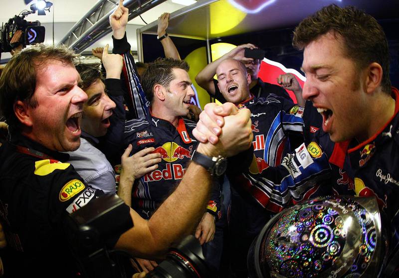 ABU DHABI, UNITED ARAB EMIRATES - NOVEMBER 14:  Team of Sebastian Vettel of Germany and Red Bull Racing celebrates after winning the driver's championship during the Abu Dhabi Formula One Grand Prix at the Yas Marina Circuit on November 14, 2010 in Abu Dhabi, United Arab Emirates.  (Photo by Vladimir Rys/Getty Images)