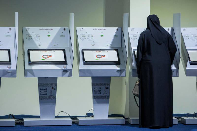 FUJEIRAH, UNITED ARAB EMIRATES, 03 OCTOBER 2015. Voters cast their vote in the 2015 Federal National Council election at the Fujeirah FNC voting station located in the Fujeirah Expo Center. (Photo: Antonie Robertson/The National) Journalist: Ruba Haza. Section: National. *** Local Caption ***  AR_0310_Fujairah_FNC_Voting-27.JPG