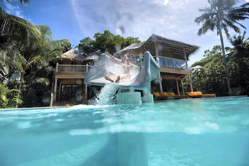 The water slide plunges straight into the Indian Ocean. Courtesy Soneva Fushi
