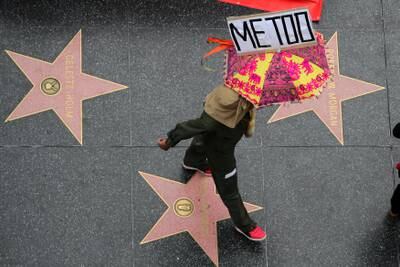 A demonstrator takes part in a #MeToo protest march for survivors of sexual assault and their supporters in Hollywood, Los Angeles, California U.S. November 12, 2017. REUTERS/Lucy Nicholson