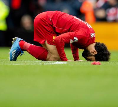 Liverpool's Mohamed Salah celebrates after scoring his team's first goal against Bournemouth. EPA
