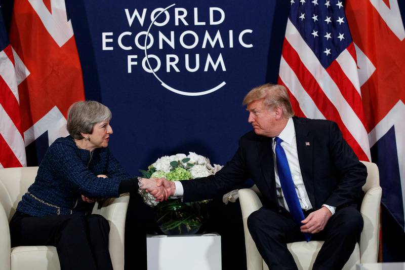 President Donald Trump meets with British Prime Minister Theresa May at the World Economic Forum, Thursday, Jan. 25, 2018, in Davos, Switzerland. (AP Photo/Evan Vucci)