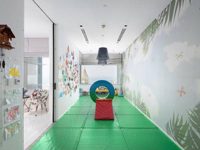 One of the rooms currently serves as a family-friendly playroom. Courtesy Luxhabitat Sotheby's International Realty