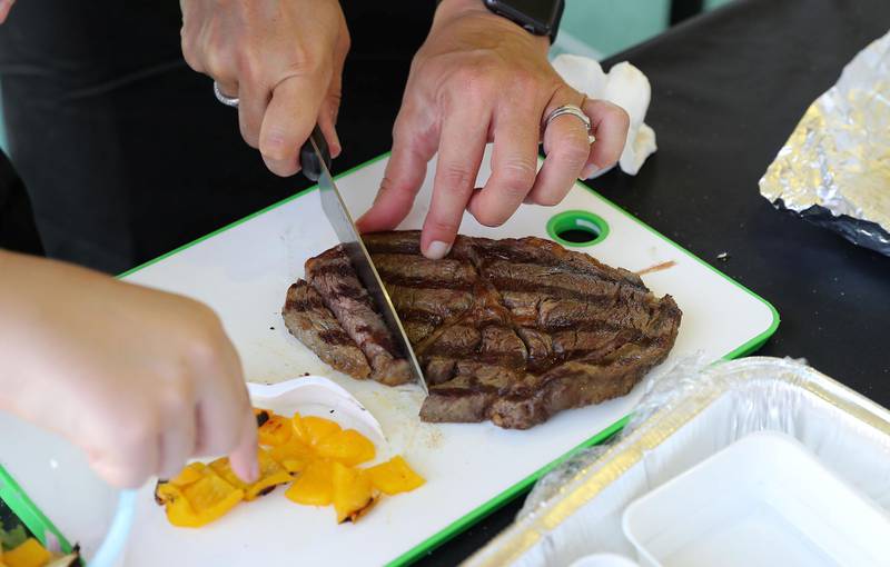 ABU DHABI , UNITED ARAB EMIRATES ,  November 9 , 2018 :- People taking part in the cooking challenge during the Taste of Abu Dhabi held at Du Arena on Yas Island in Abu Dhabi.  ( Pawan Singh / The National )  For News/Online/Instagram
