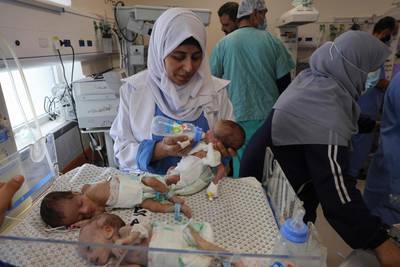 Palestinian medics care for babies evacuated from Al Shifa Hospital to the Emirates Hospital in Rafah in the southern Gaza Strip. AFP