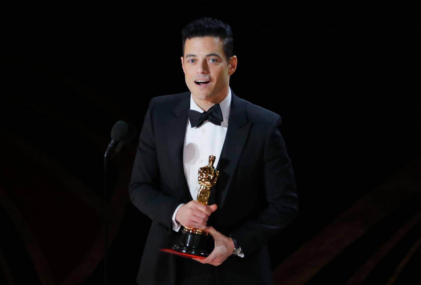 91st Academy Awards - Oscars Show - Hollywood, Los Angeles, California, U.S., February 24, 2019. Rami Malek reacts while holding his Oscar after accepting the Best Actor award for his role in "Bohemian Rhapsody". REUTERS/Mike Blake