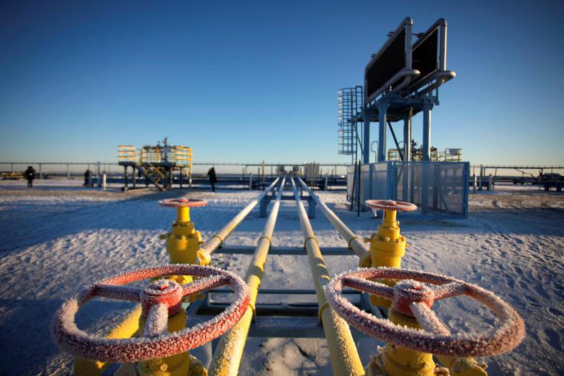 Ice sits on a valve control wheel connected to pipe work at OAO Gazprom's new Bovanenkovo deposit, a natural gas field near Bovanenkovskoye on the Yamal Peninsula in Russia, on Tuesday, Oct. 23, 2012. OAO Gazprom, the Russian supplier of a quarter of Europe's natural gas, said it's expanded production and storage capacity to meet winter demand, avoiding a repeat of the shortfall that occurred at the start of the year. Photographer: Alexander Zemlianichenko Jr./Bloomberg 