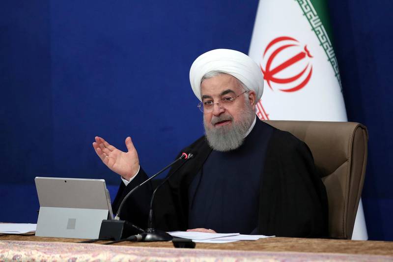 In this photo released by the official website of the office of the Iranian Presidency, President Hassan Rouhani speaks in a cabinet meeting in Tehran, Iran, Wednesday, Jan. 27, 2021.  Rouhani on Wednesday criticized the country's hard-liner dominated judiciary over last week's prosecution of the country's telecommunications minister. (Iranian Presidency Office via AP)