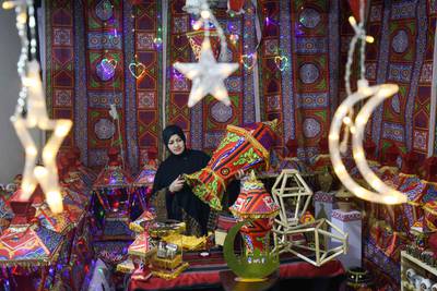 Palestinian artisan Reham Shurab makes traditional 'fanous' lanterns at her home workshop in the Gaza Strip. AFP