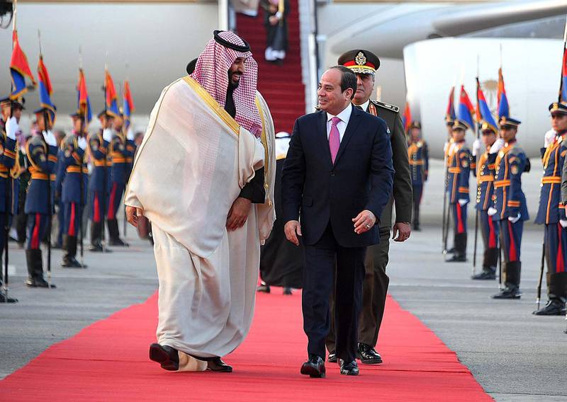 epa06579656 A handout photo made by the Egyptian Presidency shows Egyptian President Abdel Fattah al-Sisi (R) welcoming Saudi Crown Prince Mohammad Bin Salman (L) at Cairo Airport, Egypt, 04 March 2018. Mohammad bin Salman is on a three-days official visit to Egypt.  EPA/EGYPTIAN PRESIDENCY HANDOUT  HANDOUT EDITORIAL USE ONLY/NO SALES