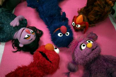 A group of Muppets interact during the filming of a scene on the set of the show in a studio in Amman, Jordan. Reuters