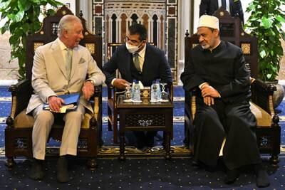 The Grand Imam of Al Azhar Mosque, Sheikh Ahmed Al Tayeb, right, meets Prince Charles. left.  AFP