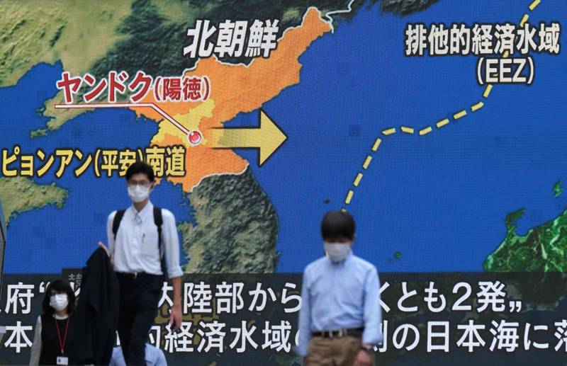 A map detailing North Korea's missile launch towards the Sea of Japan, part of a news broadcast at Akihabara, Tokyo. AFP